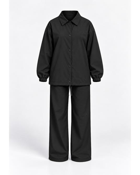 Translation missing: en.The signature tracksuit - Black (pre-order)