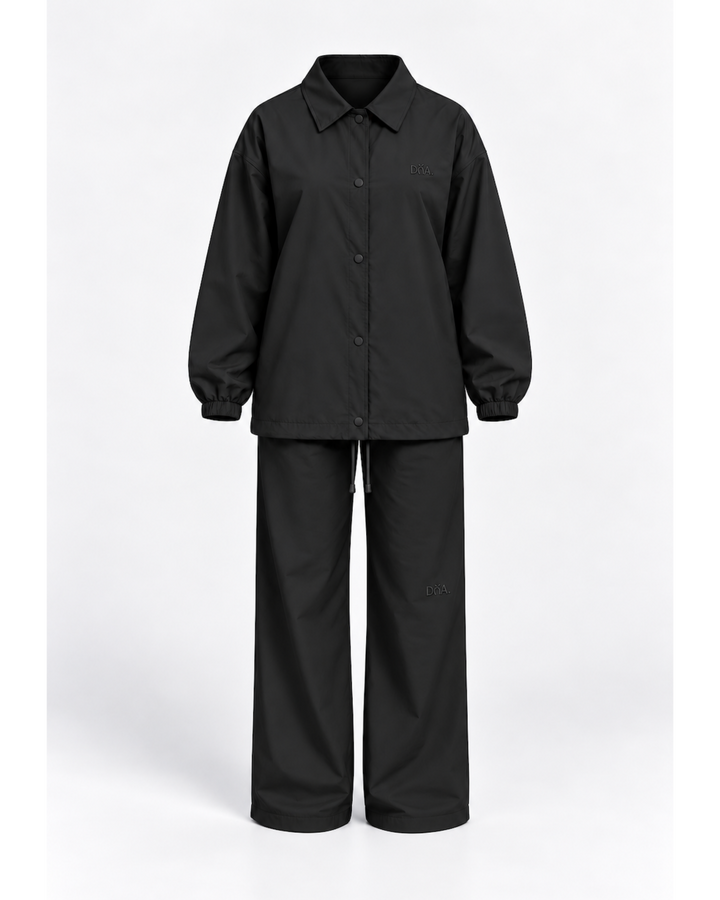 Translation missing: en.The signature tracksuit - Black (pre-order)